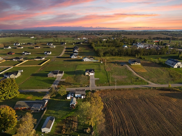 aerial view at dusk with a rural view