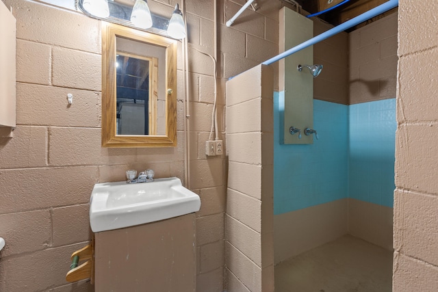 bathroom featuring vanity and walk in shower