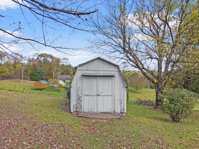 view of outdoor structure with a lawn