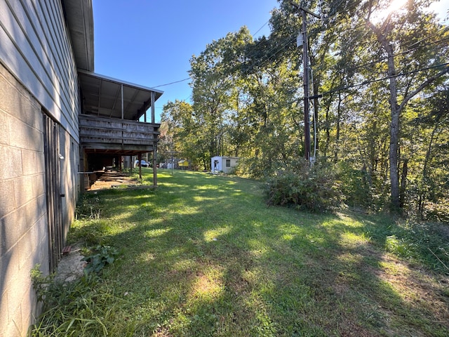 view of yard featuring a deck