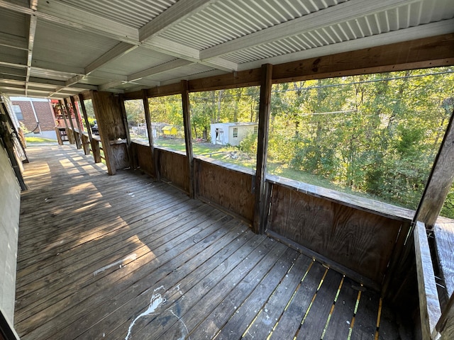 unfurnished sunroom featuring a healthy amount of sunlight