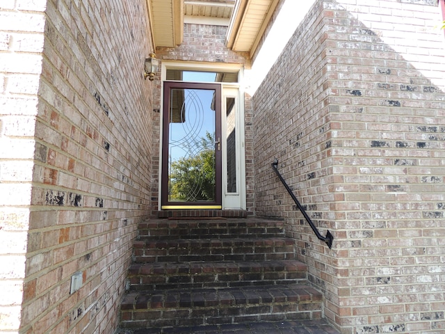 view of side of property featuring central AC, a garage, and a lawn