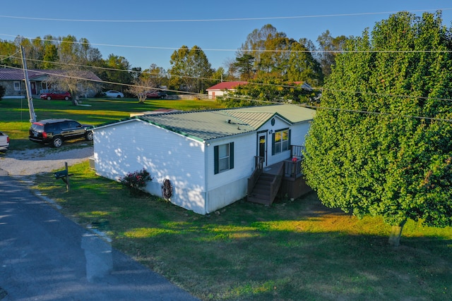 exterior space with a lawn