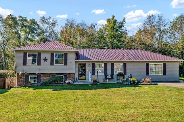 split level home with a front yard