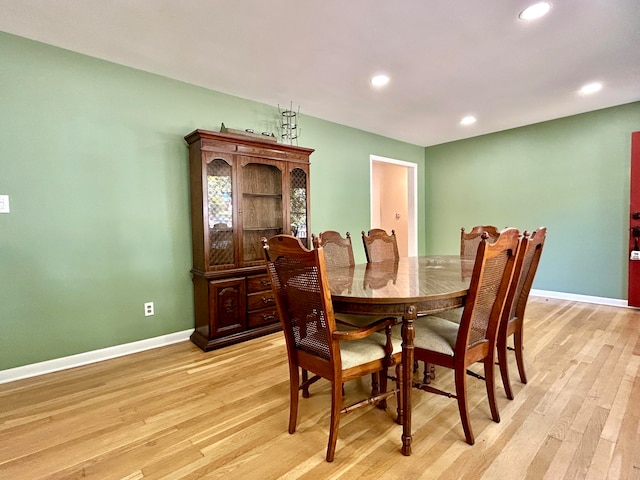 dining room featuring light hardwood / wood-style flooring