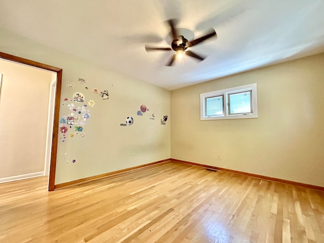 empty room featuring light hardwood / wood-style floors and ceiling fan