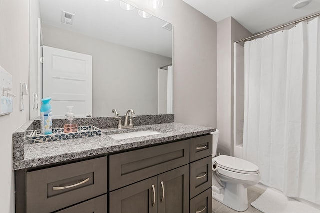 full bathroom featuring vanity, shower / bath combination with curtain, and toilet