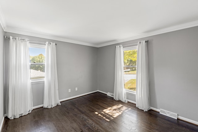 unfurnished room with dark wood-type flooring and crown molding