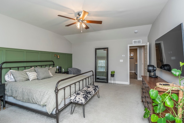 carpeted bedroom with ceiling fan and lofted ceiling