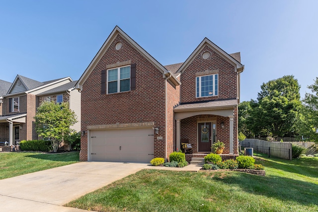 view of front of house featuring a garage, a front lawn, and central air condition unit