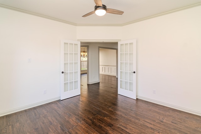 spare room with french doors, dark wood-type flooring, and crown molding