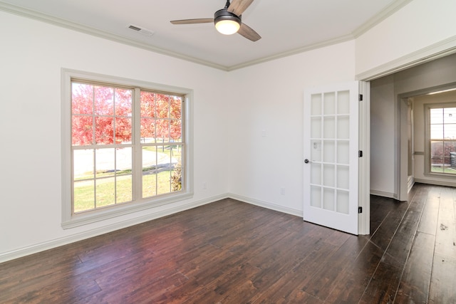 unfurnished room featuring crown molding, ceiling fan, and dark hardwood / wood-style flooring