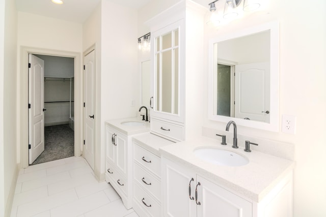 bathroom with vanity and tile patterned floors