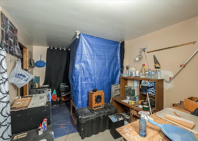 miscellaneous room featuring concrete flooring