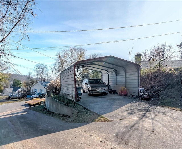 view of parking / parking lot with a carport