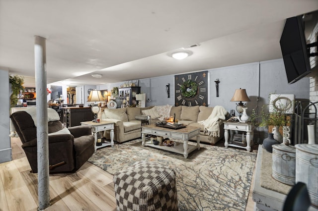 living room with light hardwood / wood-style floors