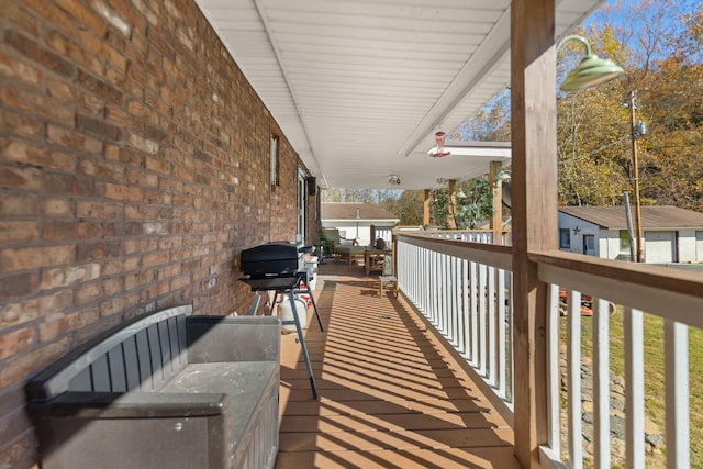 deck featuring a grill