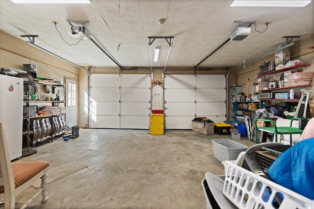 garage featuring a garage door opener