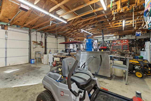 garage with a workshop area