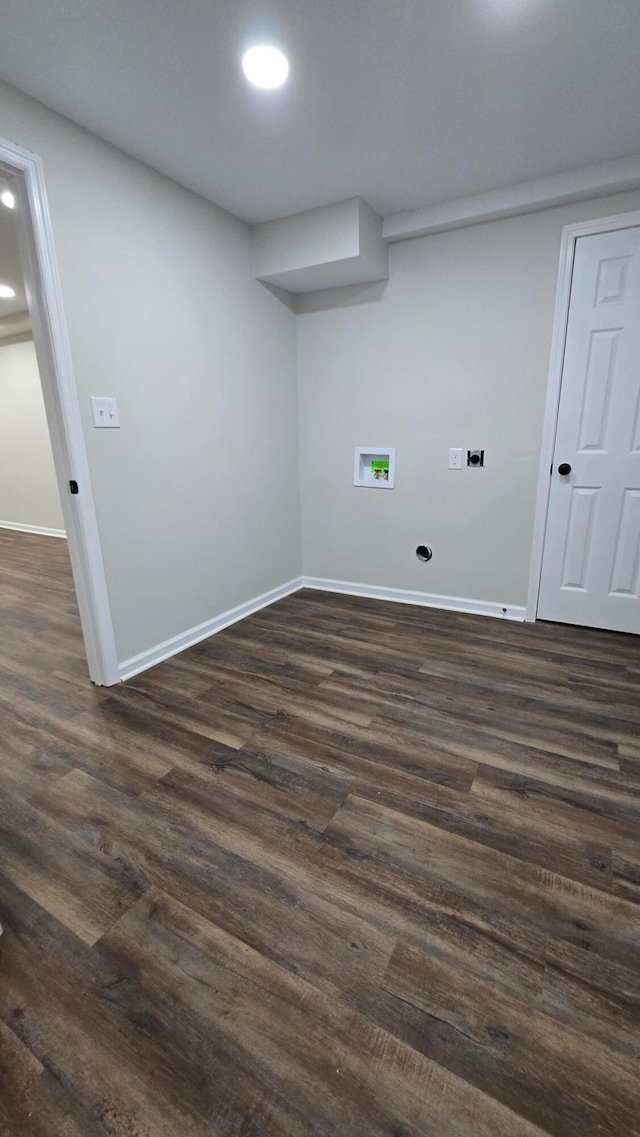 laundry room with dark wood-type flooring and washer hookup