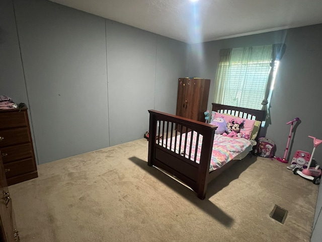 bedroom featuring carpet flooring