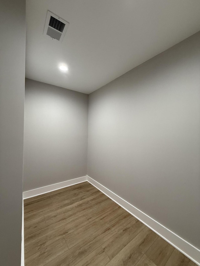 unfurnished room featuring hardwood / wood-style floors