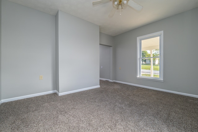 carpeted empty room with ceiling fan