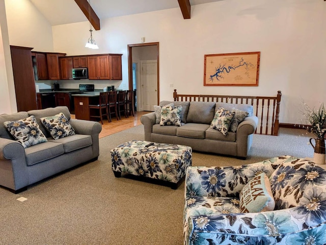 living room featuring high vaulted ceiling, beamed ceiling, and light colored carpet