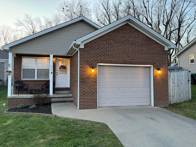 view of front of property with a front yard, a porch, and a garage