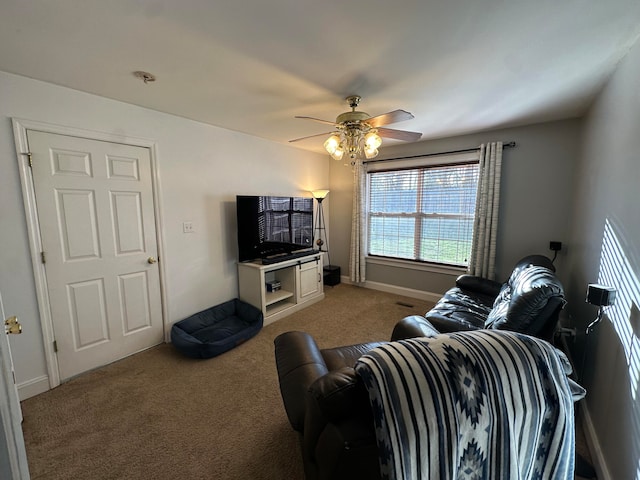 living room with carpet floors and ceiling fan