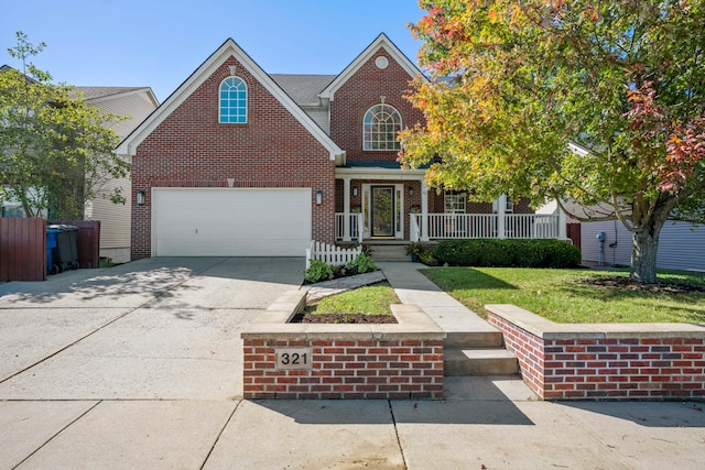 front facade featuring a porch and a garage