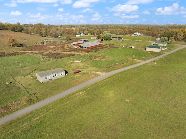 birds eye view of property featuring a rural view