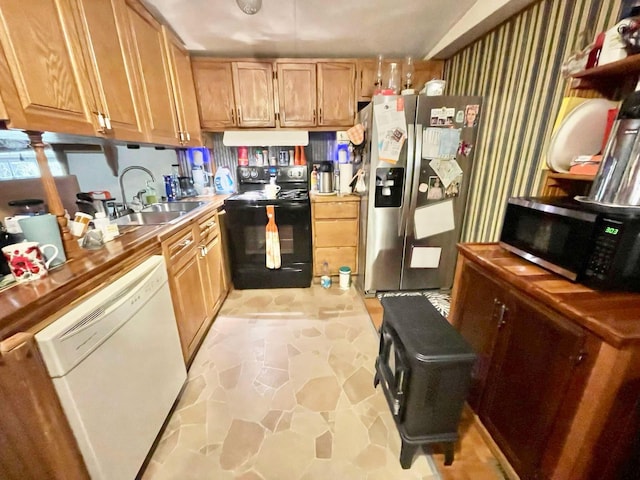 kitchen featuring stainless steel appliances and sink