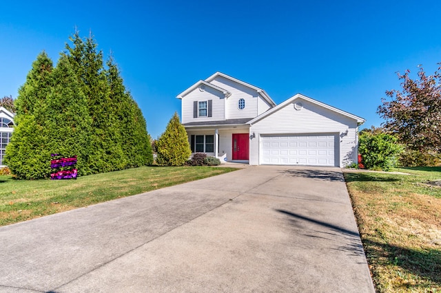 view of front of property with a front lawn and a garage