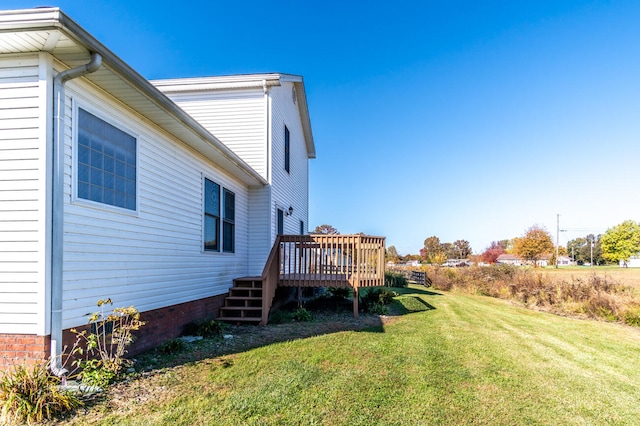 view of yard featuring a wooden deck