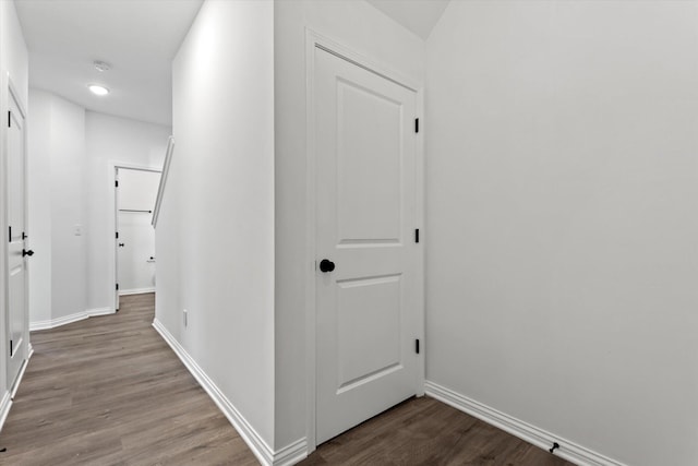 corridor with light wood-type flooring