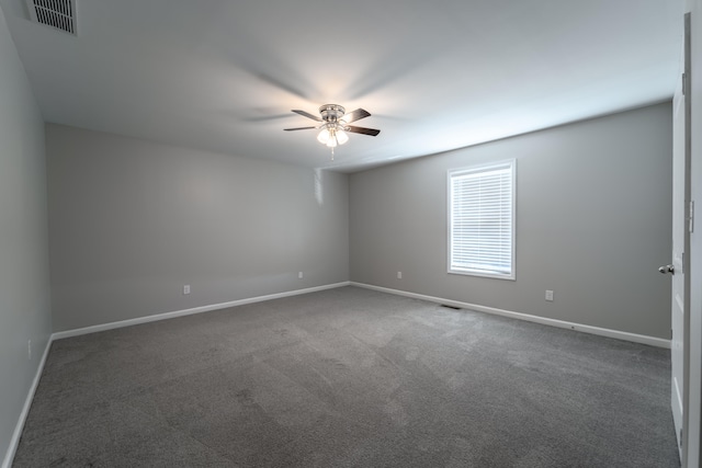 carpeted empty room with ceiling fan