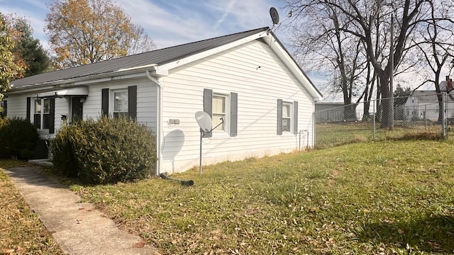 view of property exterior featuring a yard