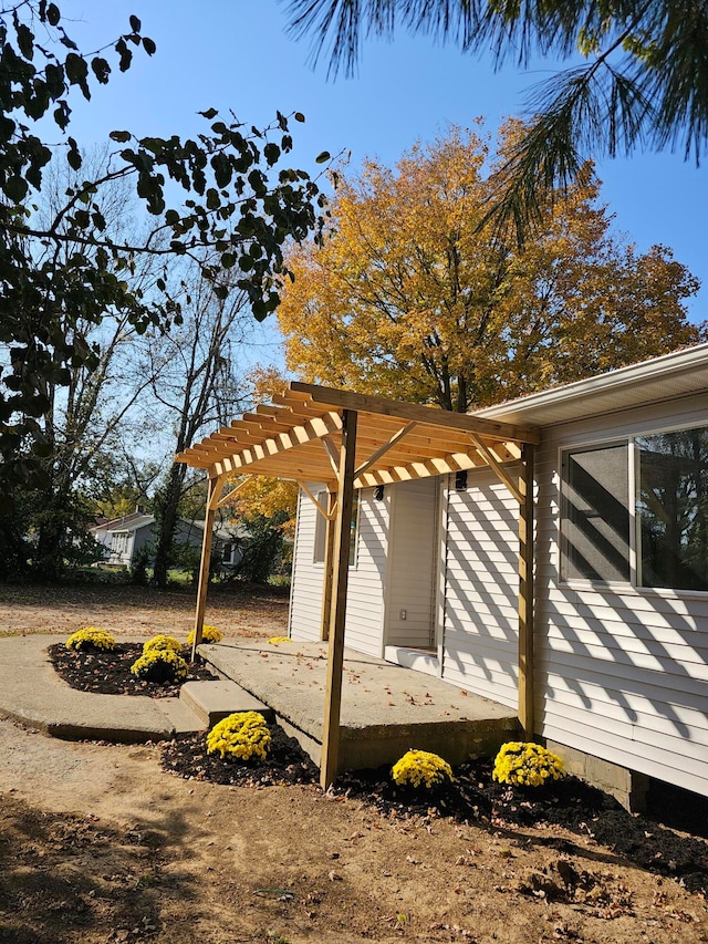 view of yard with a pergola and a patio area