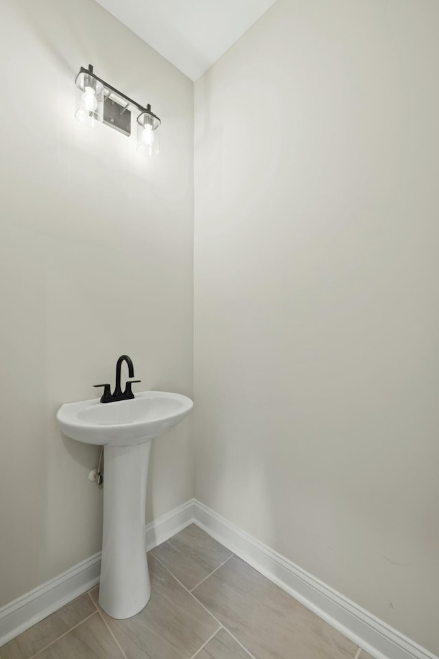 bathroom featuring baseboards