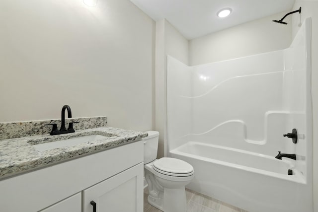 full bathroom with tile patterned floors, vanity, toilet, and bathing tub / shower combination