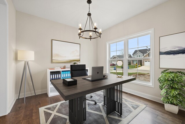 kitchen with sink, white cabinets, stainless steel appliances, and wood-type flooring