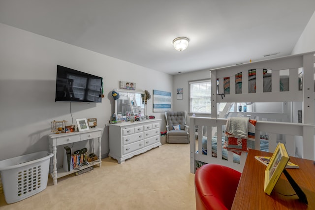 bedroom with light carpet