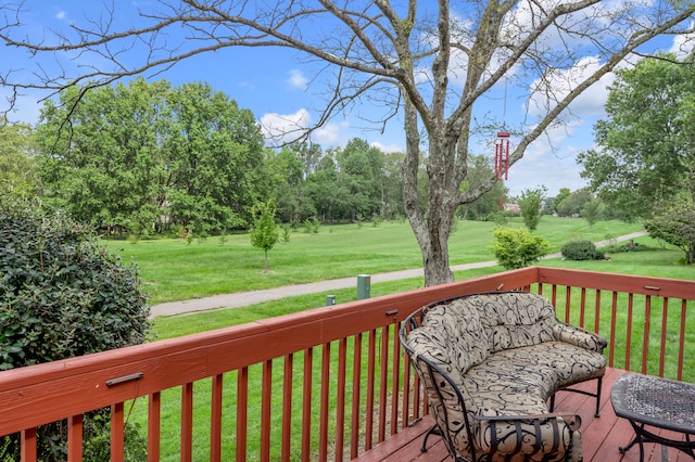 wooden deck with a yard