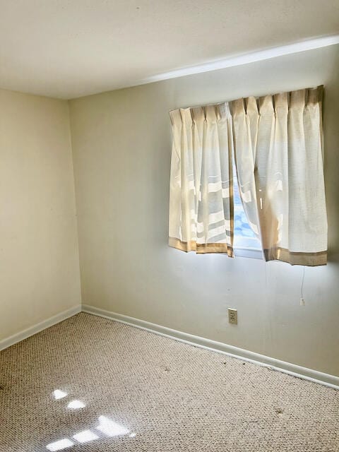 empty room with carpet floors