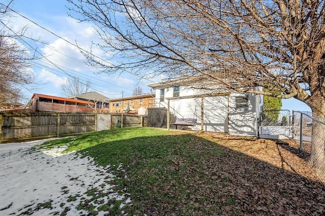 view of yard featuring a fenced backyard