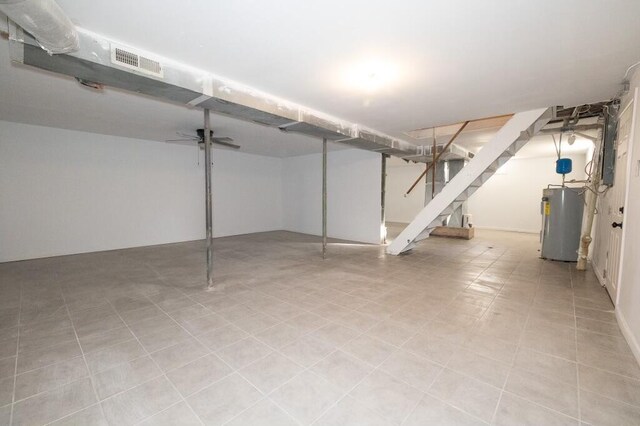 basement featuring electric water heater