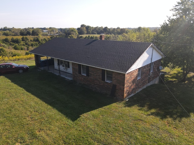 view of property exterior featuring a lawn