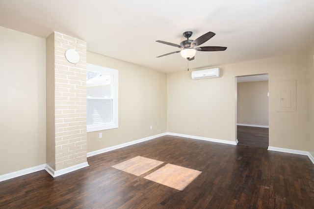 spare room with ceiling fan, a wall mounted air conditioner, and dark hardwood / wood-style flooring