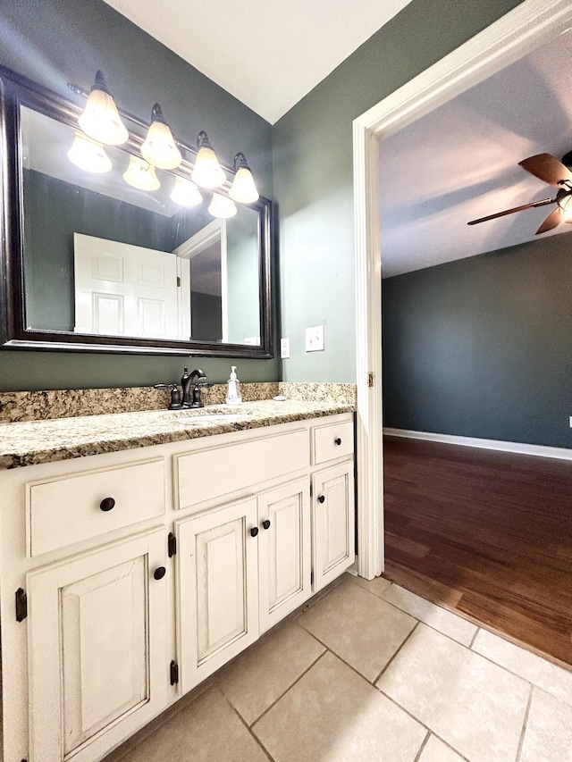 bathroom with vanity, tile patterned floors, and ceiling fan